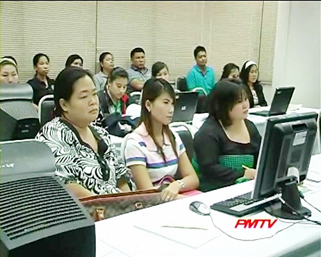 Online transactions are demonstrated to the business owners.